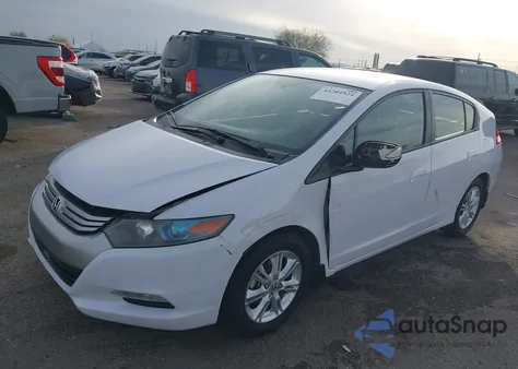 2010 Honda Insight Ex z USA, uszkodzony, nr VIN JHMZE2H76AS007075